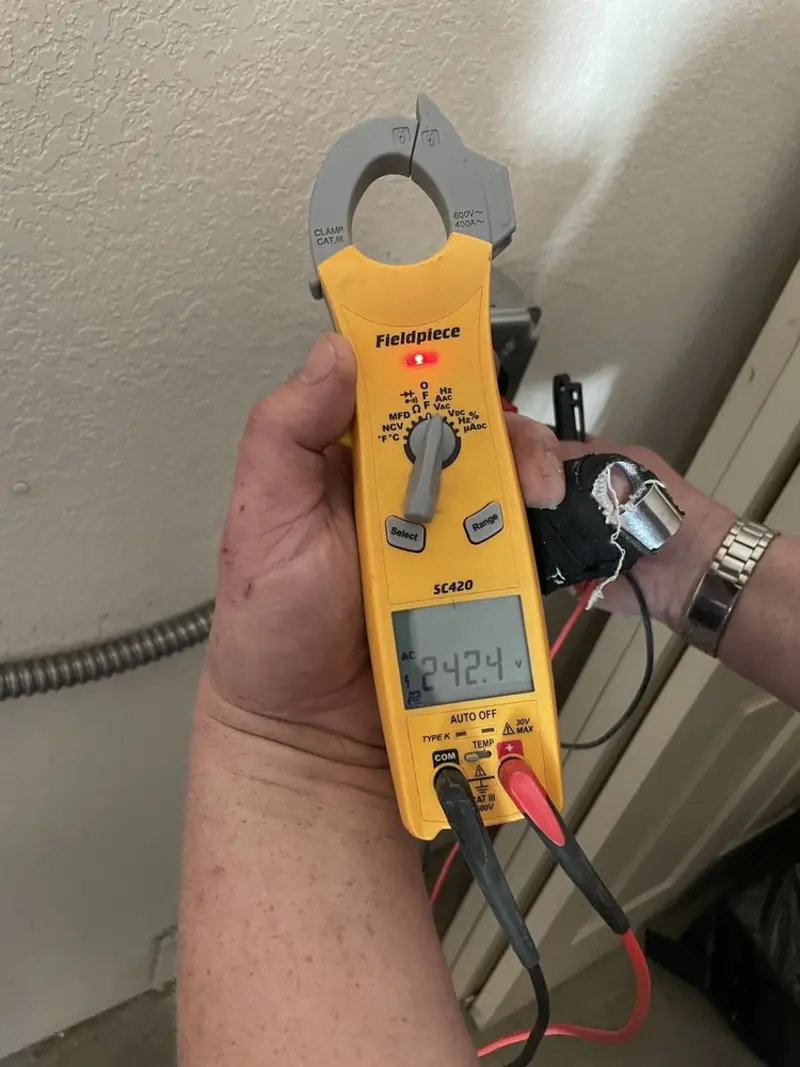 Voltage testing with clamp meter during Hot Tub / Pool Electrical Wiring in Medina